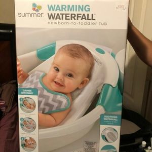 Warming waterfall tub